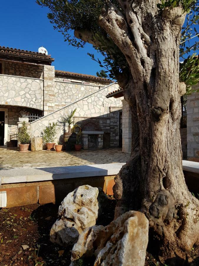 Casa Di Roccia Villa Marcana Bagian luar foto