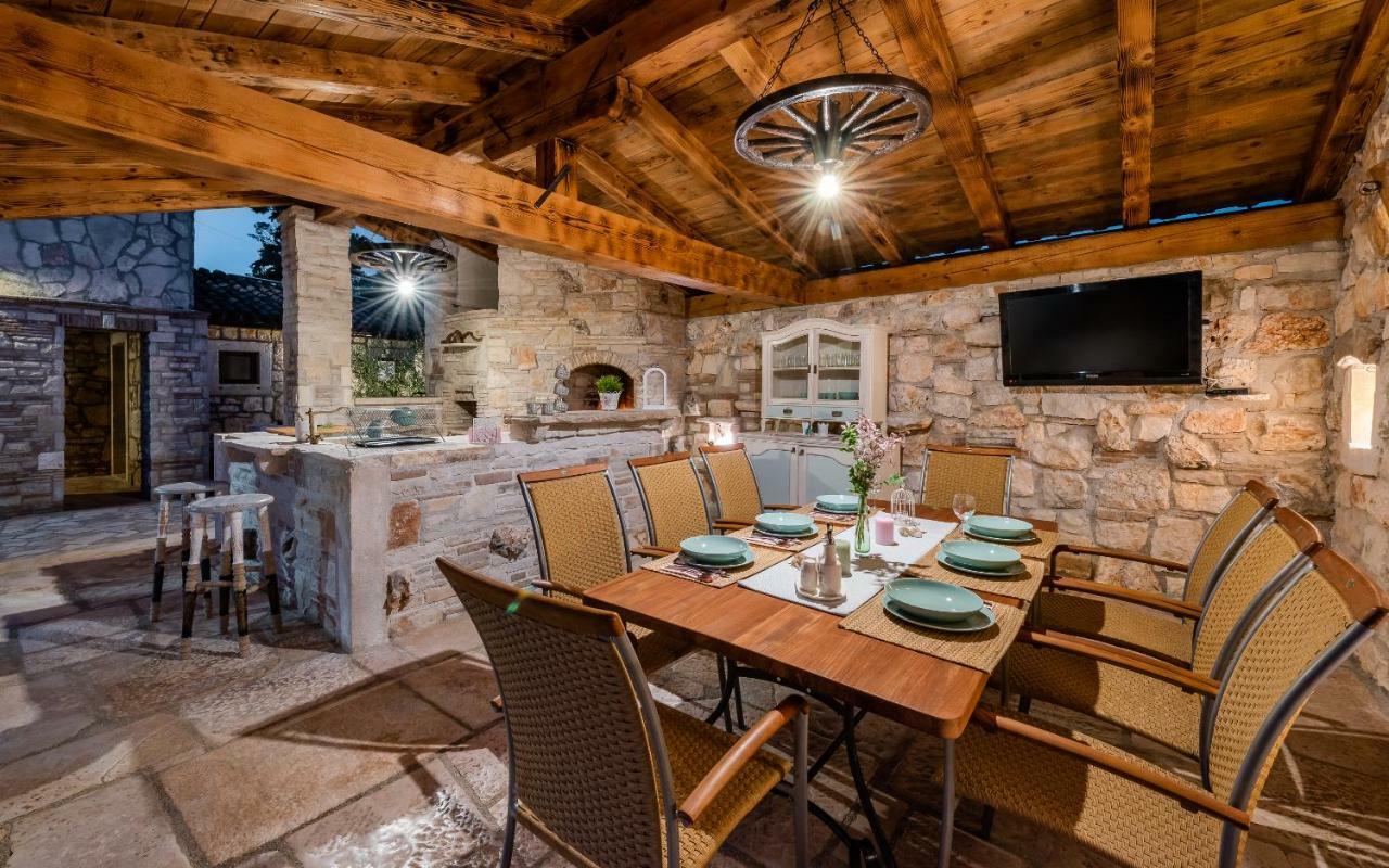 Casa Di Roccia Villa Marcana Bagian luar foto