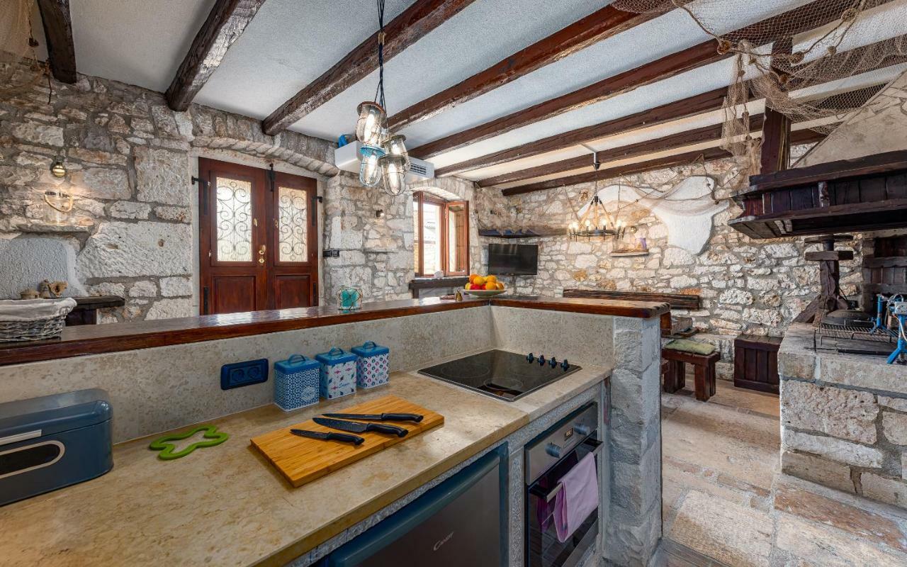 Casa Di Roccia Villa Marcana Bagian luar foto
