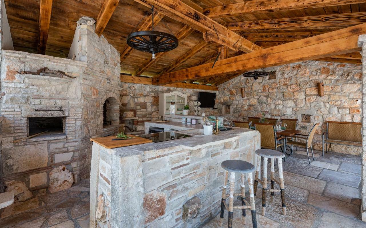 Casa Di Roccia Villa Marcana Bagian luar foto