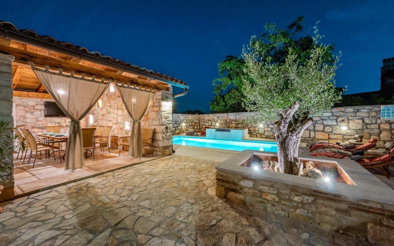 Casa Di Roccia Villa Marcana Bagian luar foto