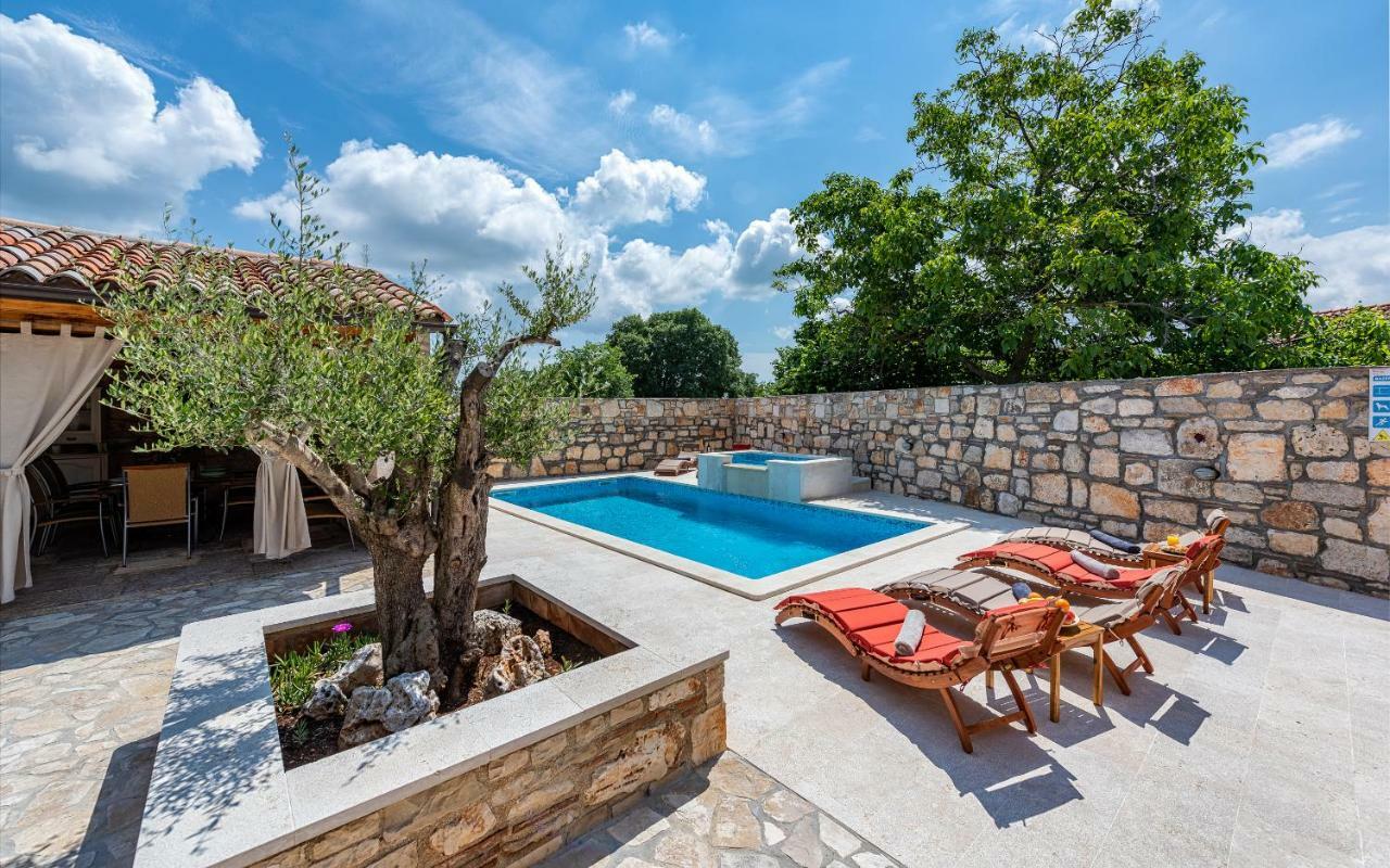 Casa Di Roccia Villa Marcana Bagian luar foto