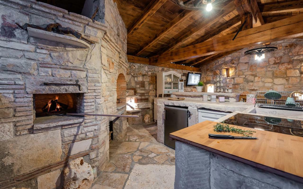Casa Di Roccia Villa Marcana Bagian luar foto
