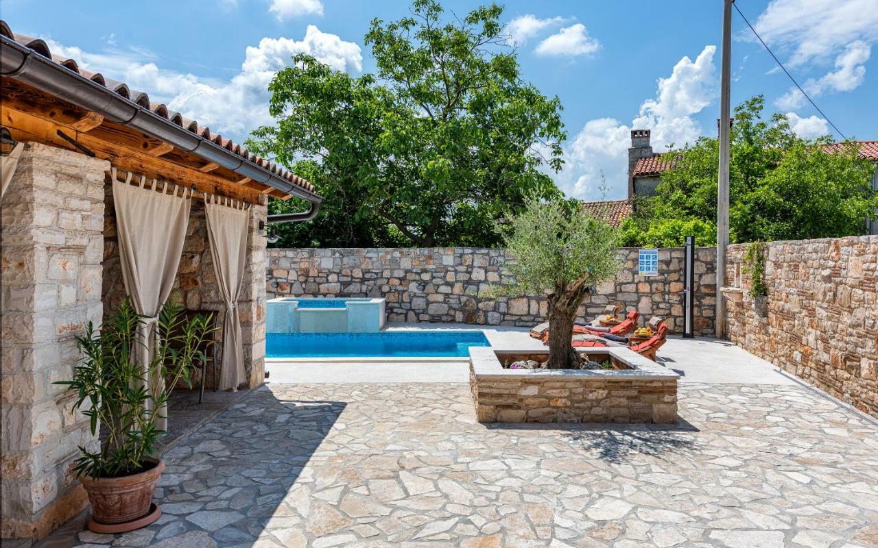 Casa Di Roccia Villa Marcana Bagian luar foto