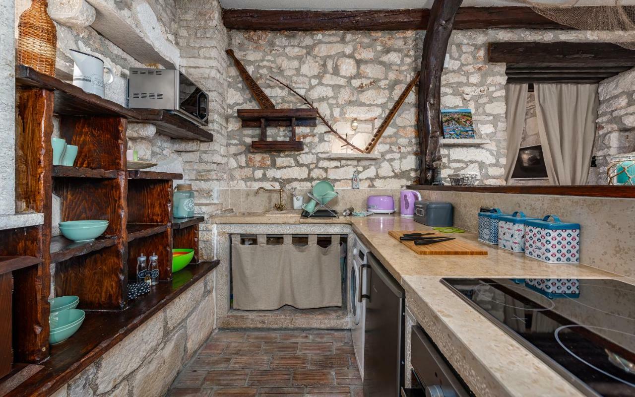 Casa Di Roccia Villa Marcana Bagian luar foto